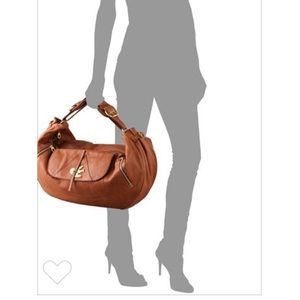 Marc Jacobs. Pedal to the metal hobo bag.